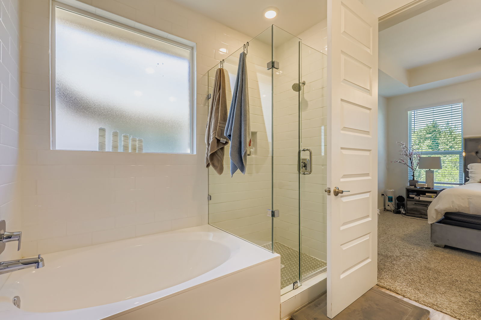 1909 Ruger Pass Leander, TX 78641 - Photo 14 of 31 Full bathroom with ensuite bathroom, a garden tub, and a stall shower