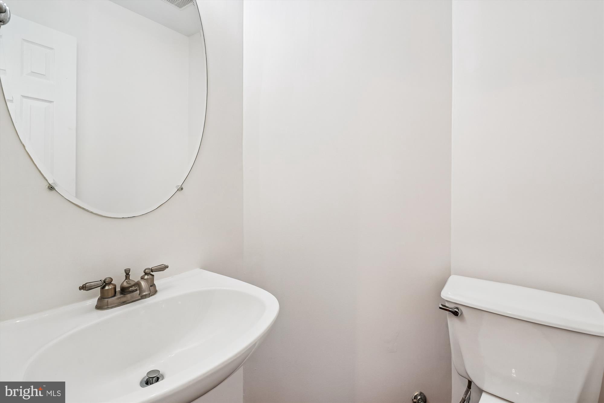 3281 Gina Place Woodbridge, VA 22193 - Photo 18 of 27 a bathroom with a sink and a toilet