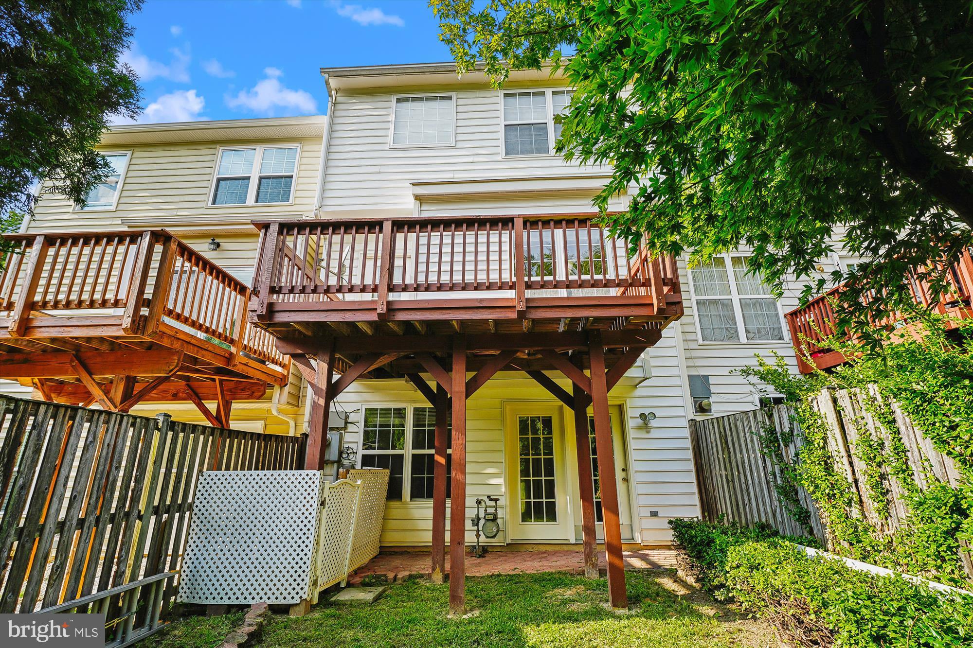 3281 Gina Place Woodbridge, VA 22193 - Photo 19 of 27 a view of a house with a wooden deck
