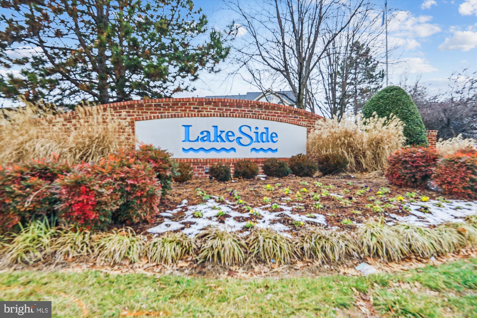 3281 Gina Place Woodbridge, VA 22193 - Photo 21 of 27 a sign that is sitting in front of flowers