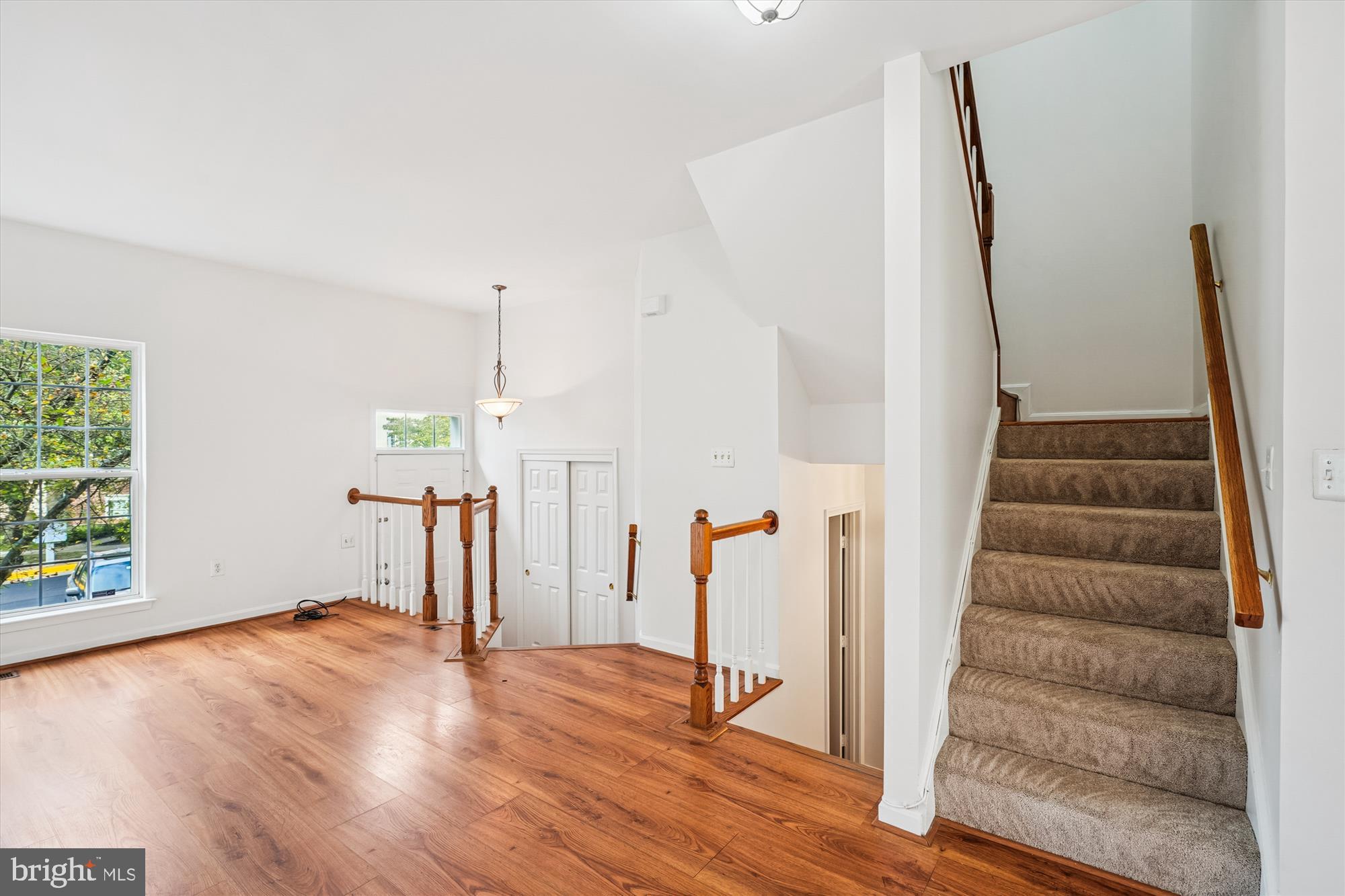 3281 Gina Place Woodbridge, VA 22193 - Photo 7 of 27 a view of entryway and hall with wooden floor