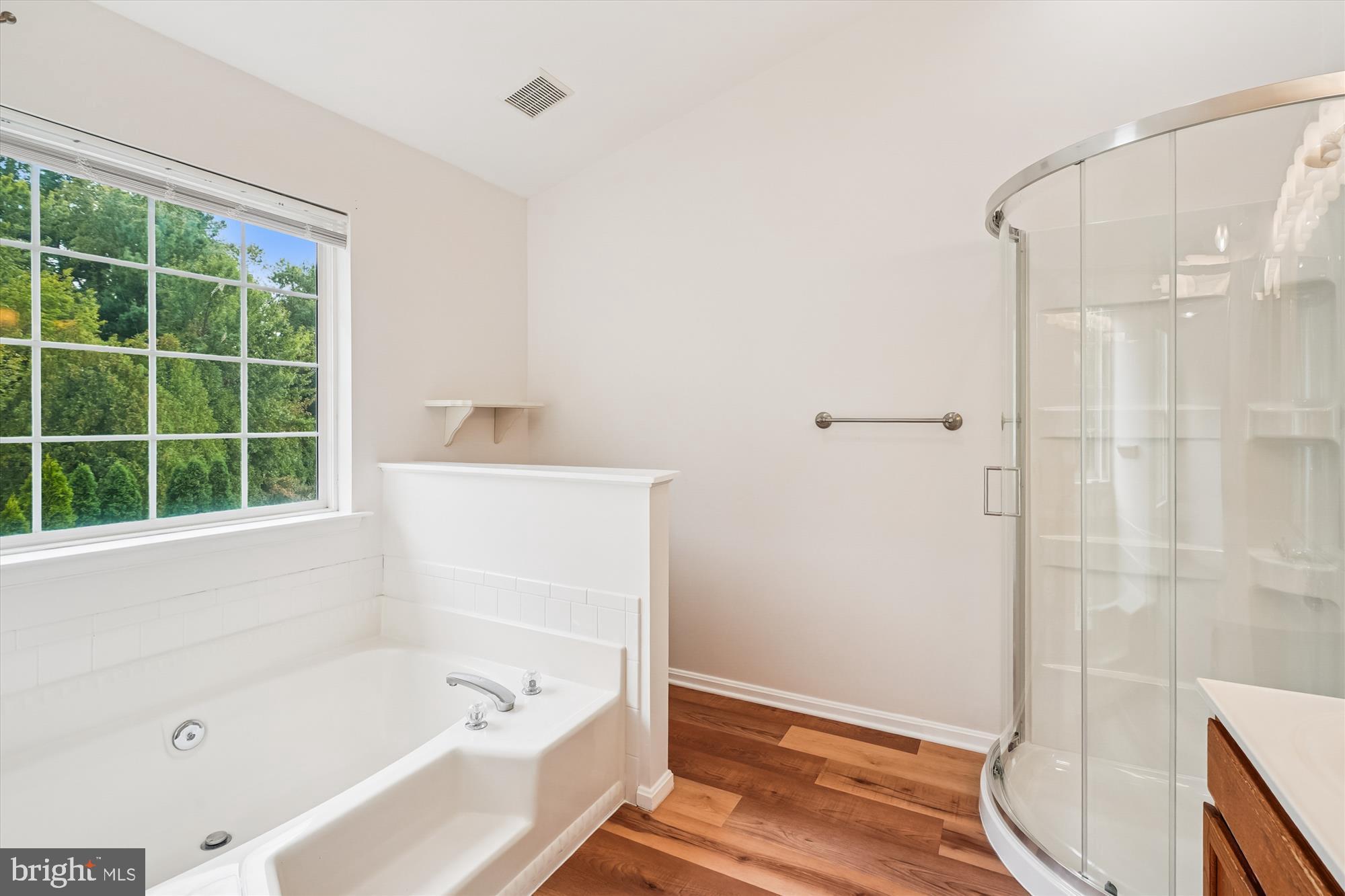 3281 Gina Place Woodbridge, VA 22193 - Photo 10 of 27 a bathroom with a bathtub and a shower