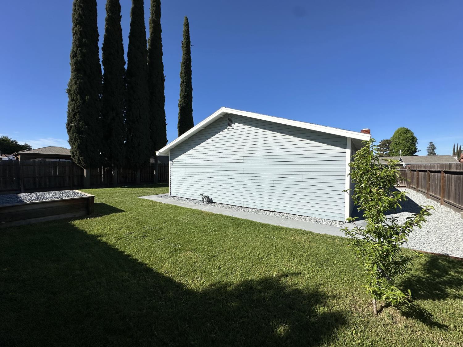 2160 Georgia Way Turlock, CA 95382 - Photo 16 of 25 a view of backyard with garden