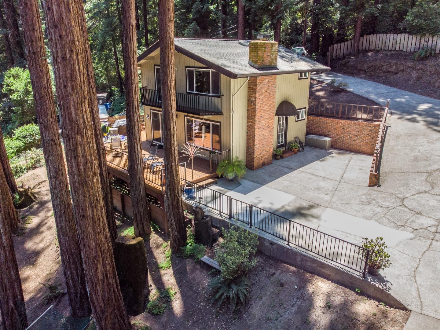 10270 Alba Road Ben Lomond, CA 95005 - Photo 15 of 41 a front view of a house with balcony