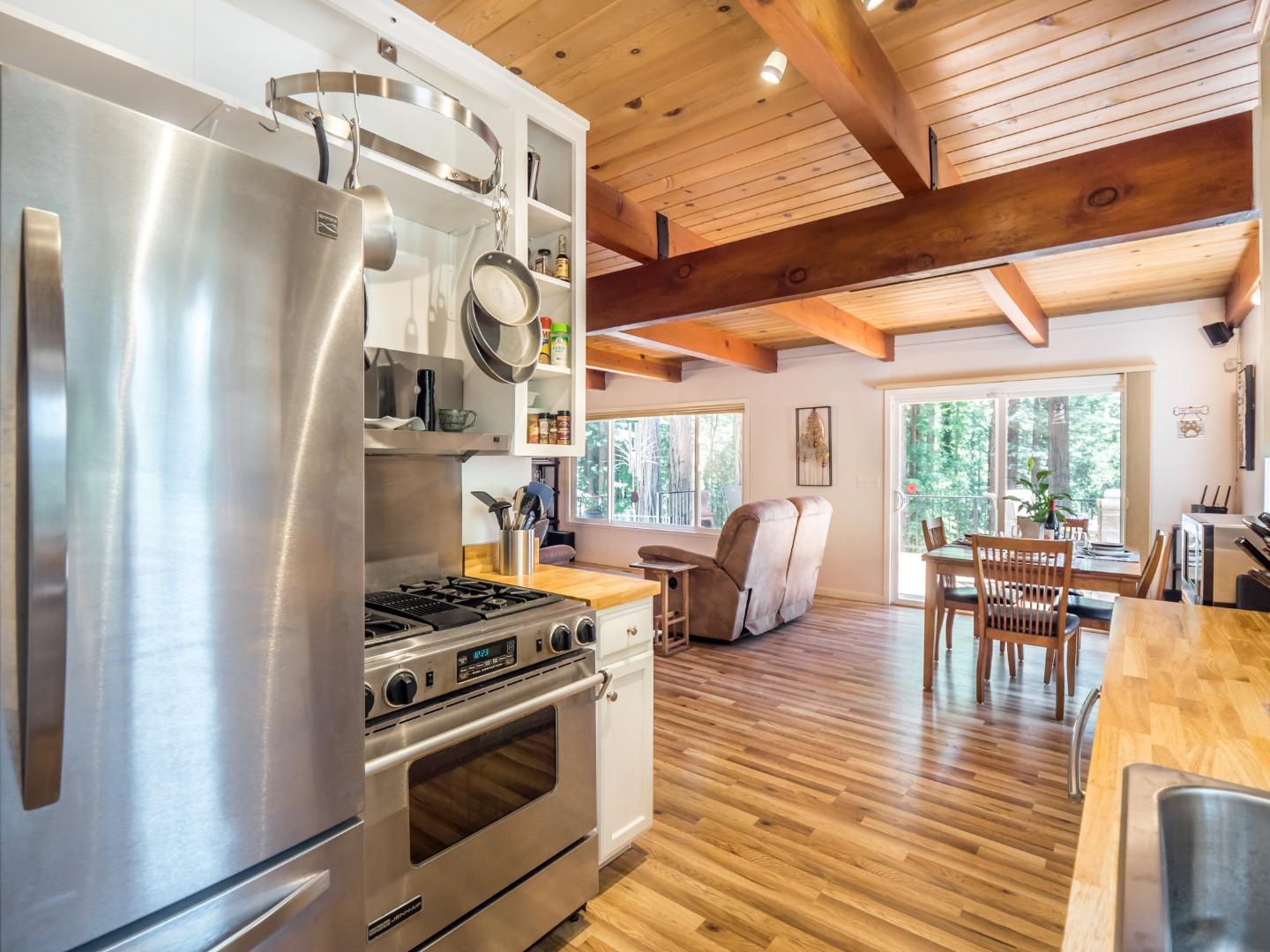 10270 Alba Road Ben Lomond, CA 95005 - Photo 6 of 41 a kitchen with stainless steel appliances granite countertop a stove and a refrigerator