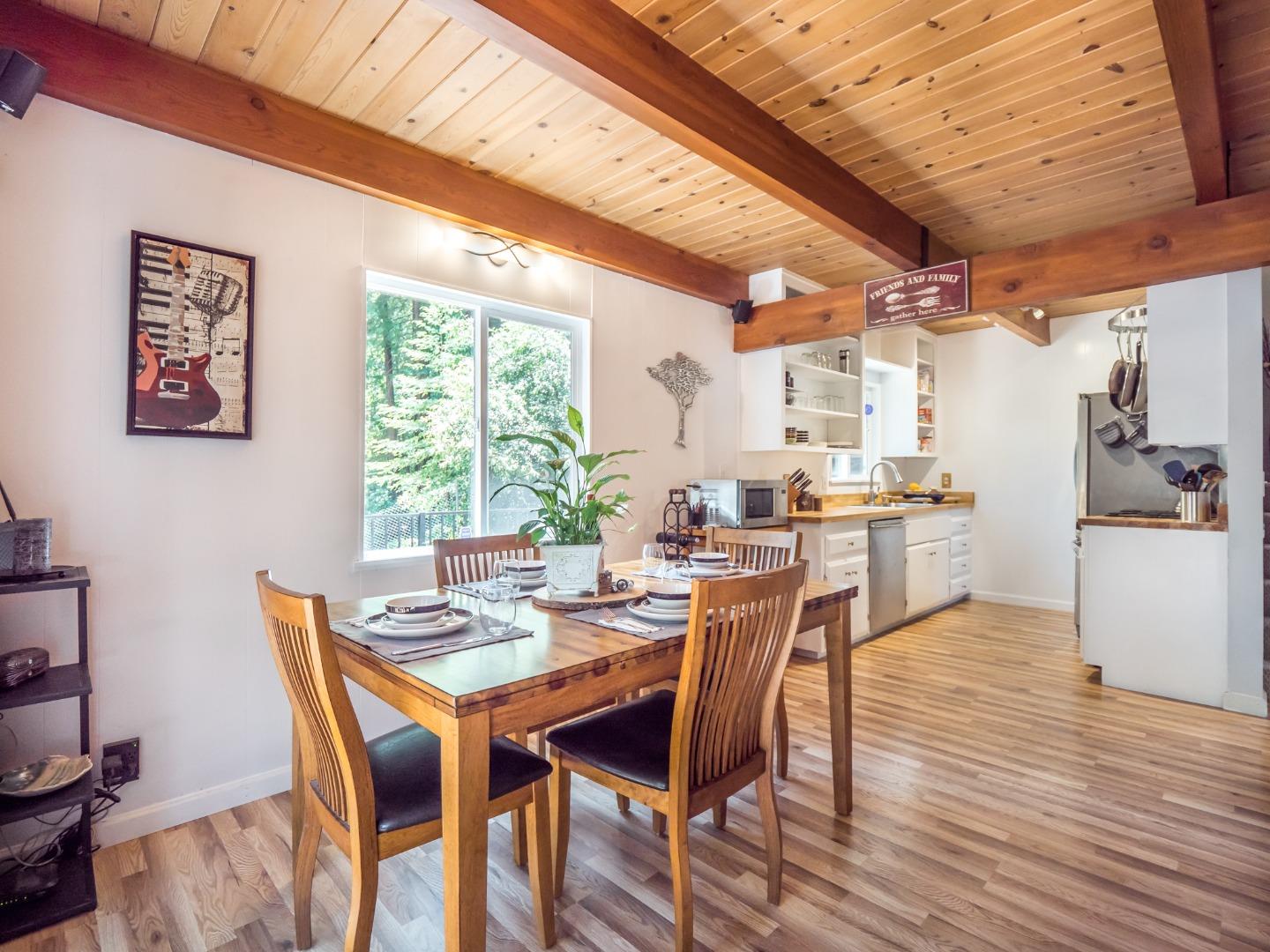 10270 Alba Road Ben Lomond, CA 95005 - Photo 9 of 41 a view of a dining room with furniture window and outside view