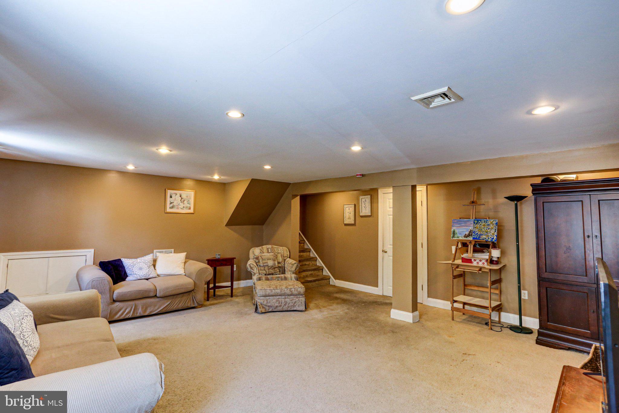 125 West Thomson Avenue Springfield, PA 19064 - Photo 25 of 41 Spacious, inviting lower-level retreat.