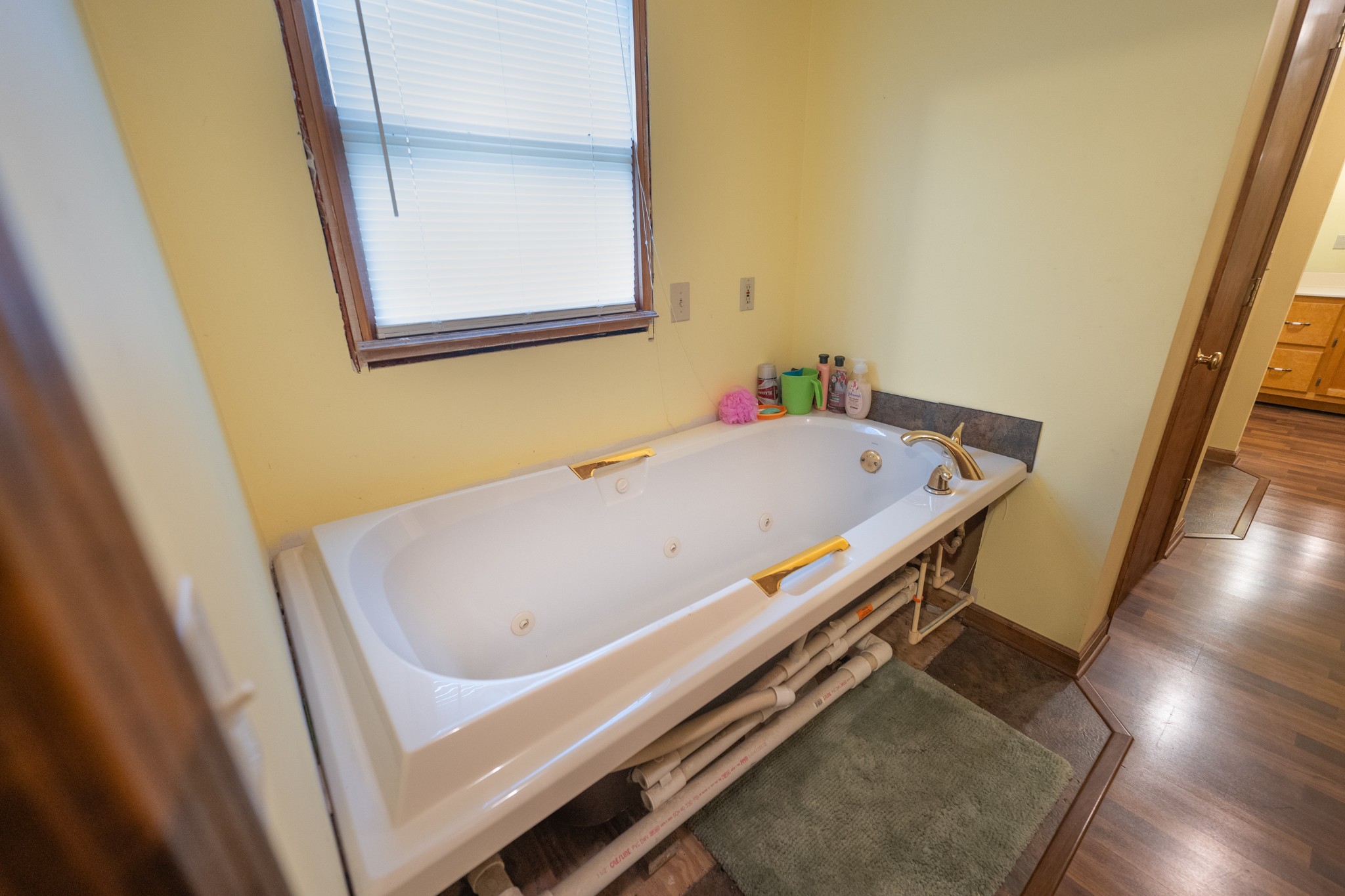 757 Bryson Road Ardmore, TN 38449 - Photo 18 of 40 a bathroom with a tub and a sink