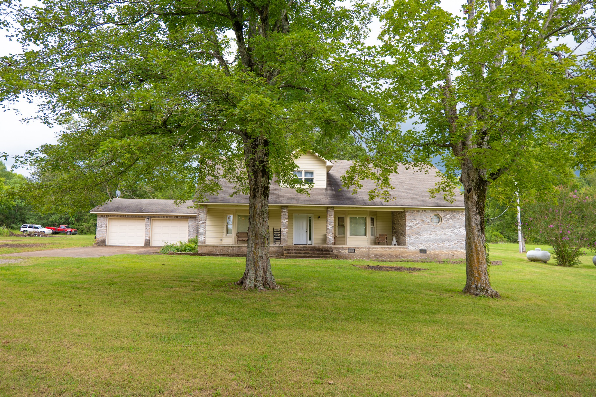 757 Bryson Road Ardmore, TN 38449 - Photo 2 of 40 a front view of a house with a yard