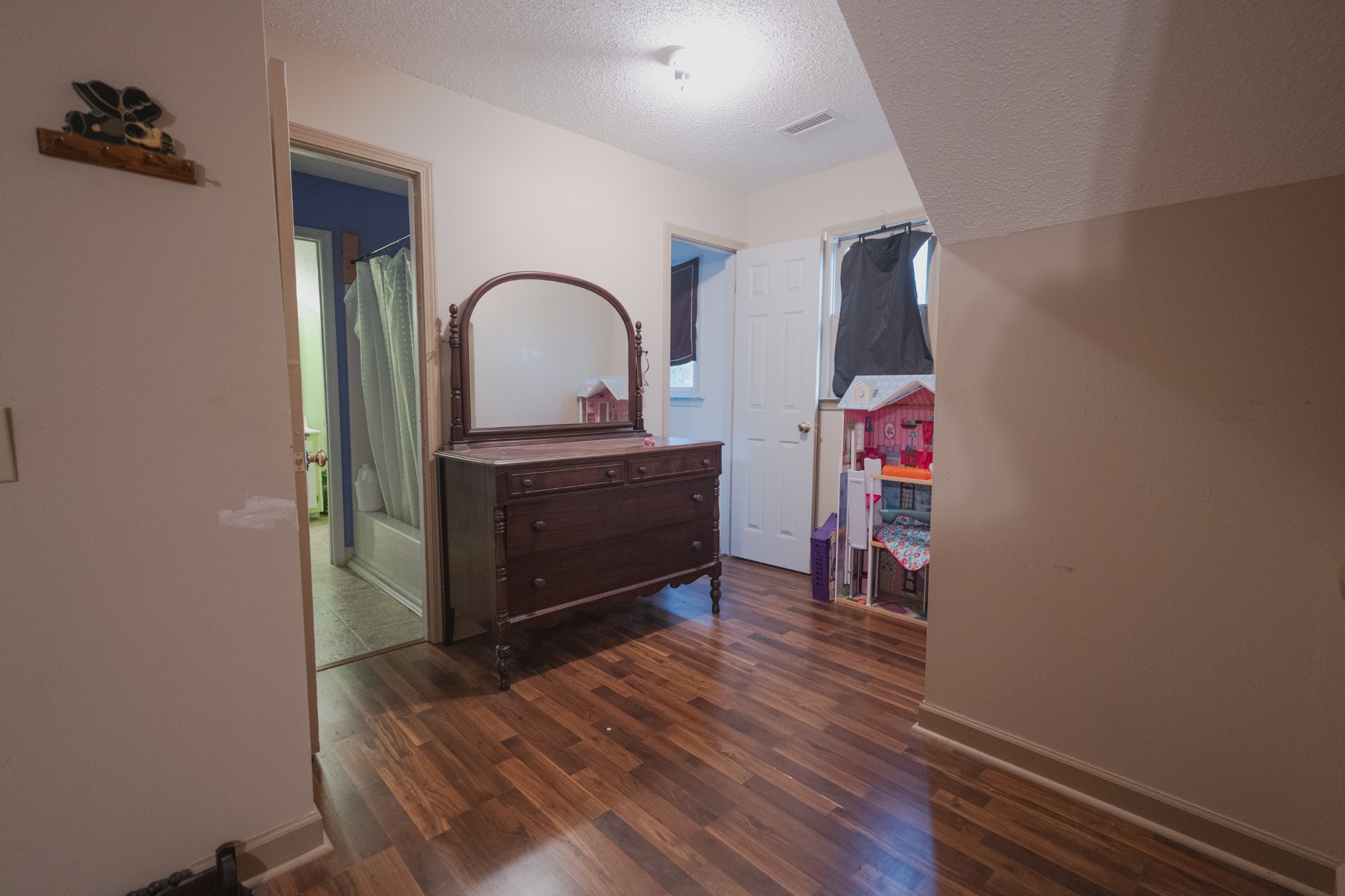 757 Bryson Road Ardmore, TN 38449 - Photo 28 of 40 a room with wooden floor and furniture