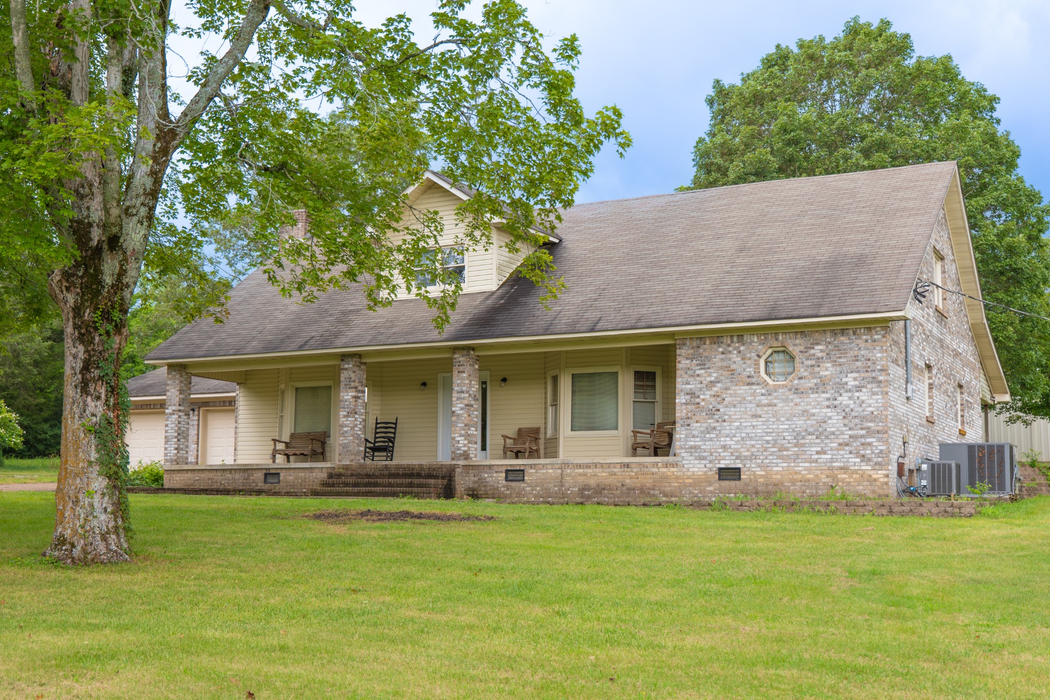 757 Bryson Road Ardmore, TN 38449 - Photo 3 of 40 a front view of house with yard and trees in the background