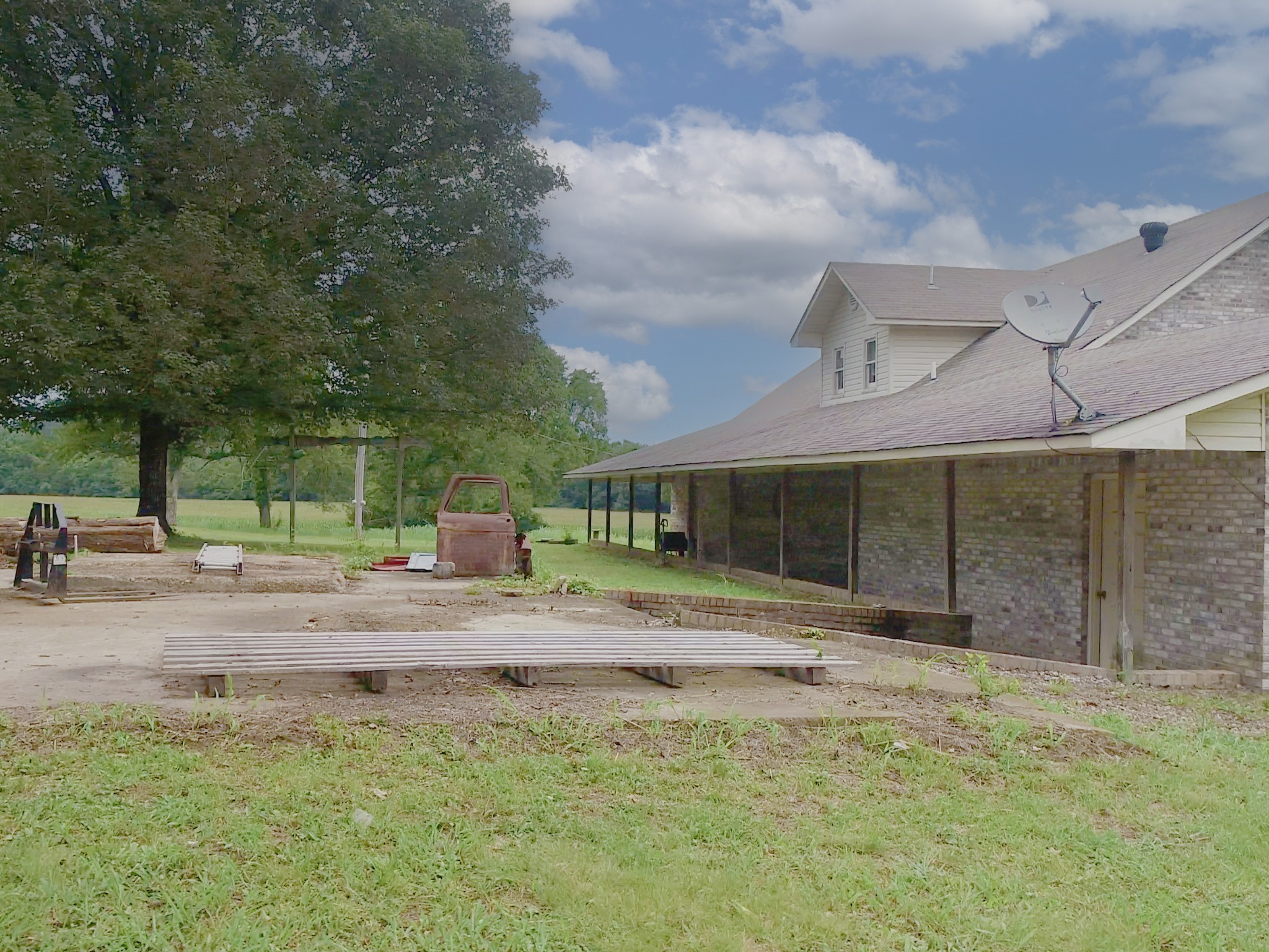 757 Bryson Road Ardmore, TN 38449 - Photo 35 of 40 a backyard of a house with shaded area