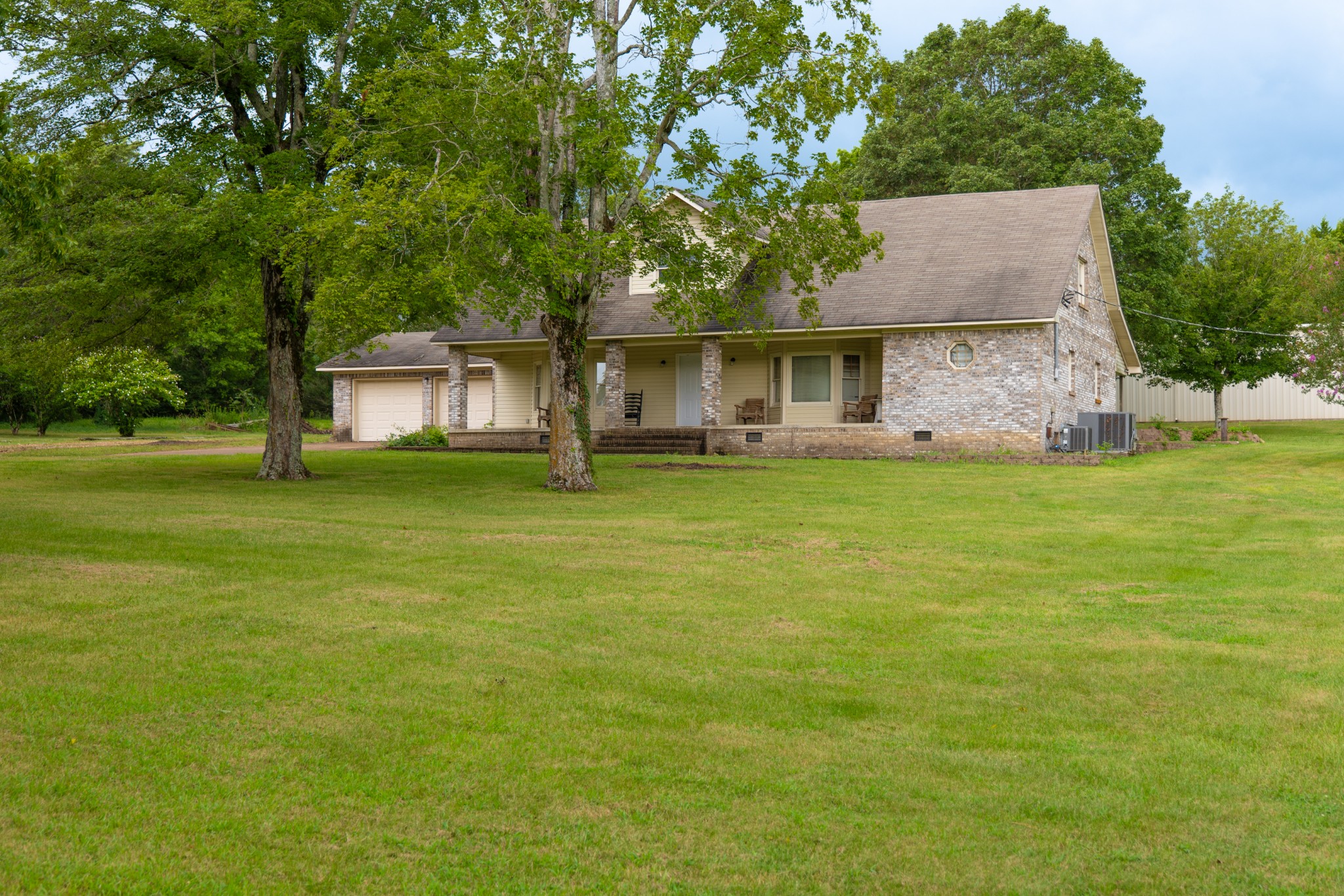 757 Bryson Road Ardmore, TN 38449 - Photo 36 of 40 a front view of a house with a garden