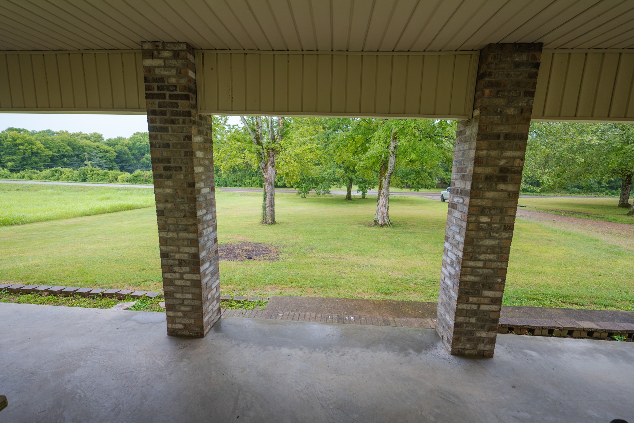 757 Bryson Road Ardmore, TN 38449 - Photo 40 of 40 a view of a yard with porch