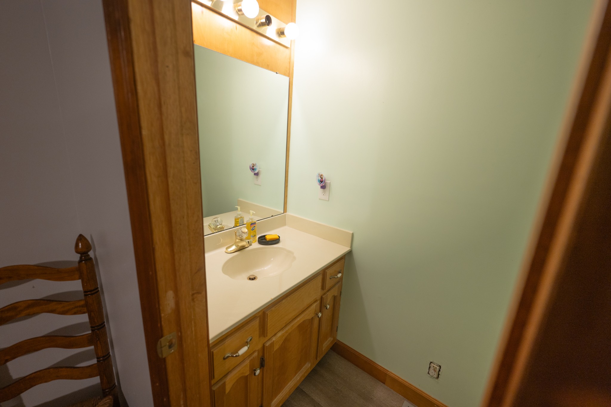 757 Bryson Road Ardmore, TN 38449 - Photo 8 of 40 a bathroom with a sink and mirror