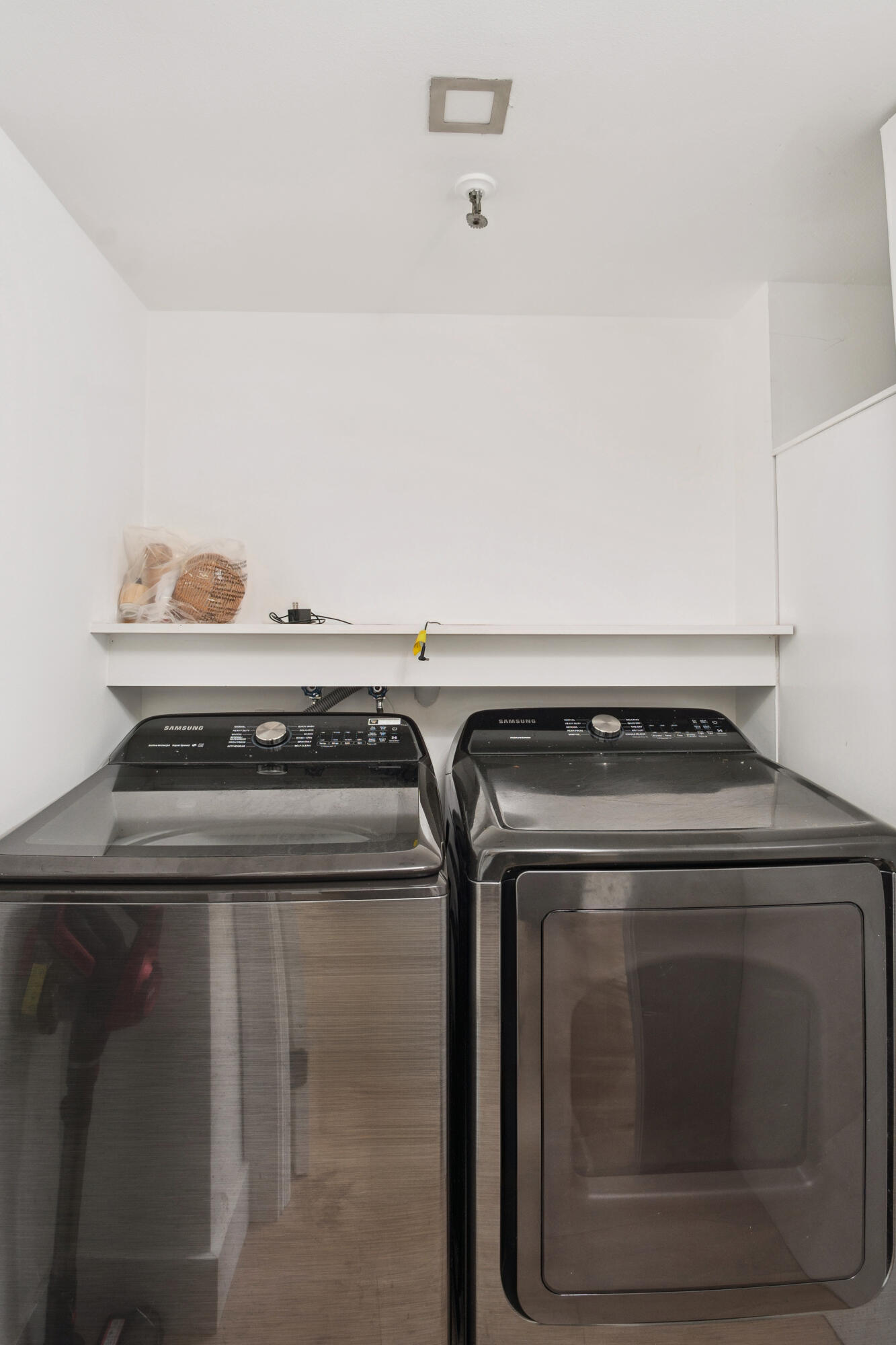 5260 Northwest 2nd Avenue, Unit 105 Boca Raton, FL 33487 - Photo 19 of 24 a view of washer and dryer