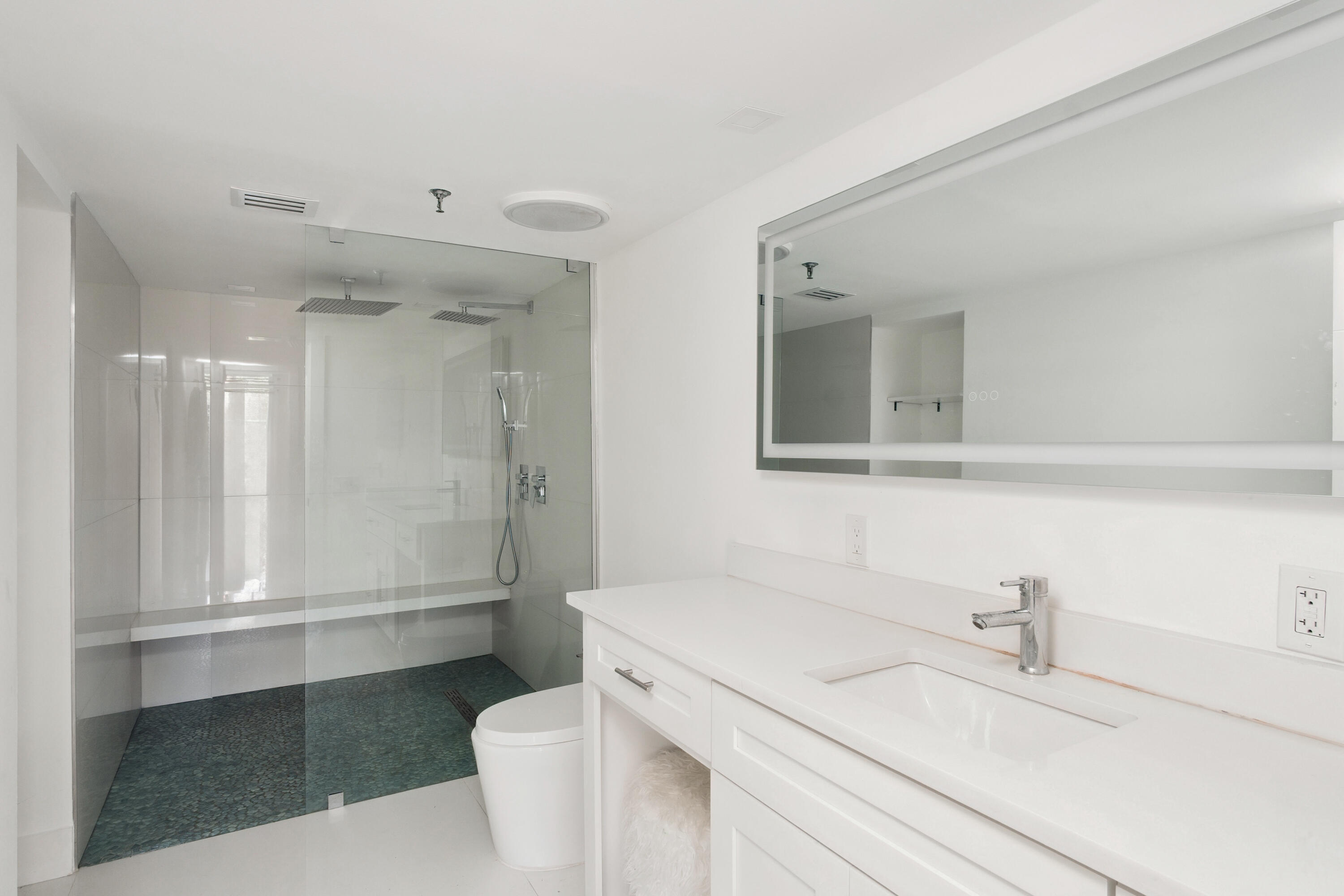 5260 Northwest 2nd Avenue, Unit 105 Boca Raton, FL 33487 - Photo 3 of 24 a bathroom with a sink and a vanity