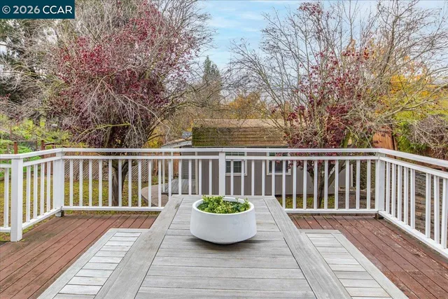 a view of a two chairs on the deck