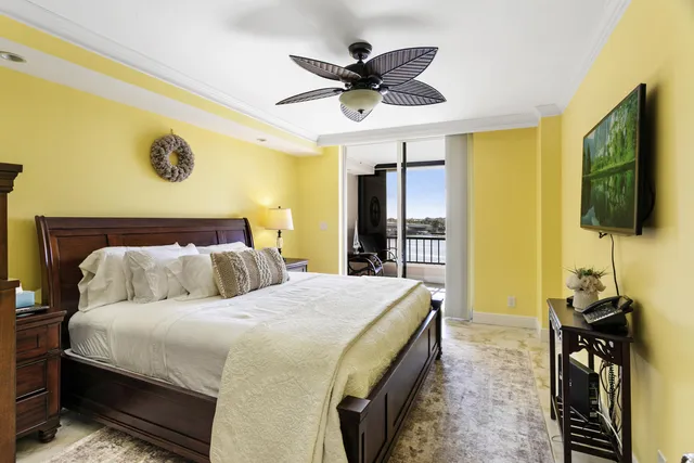 a bedroom with a bed dresser and a window