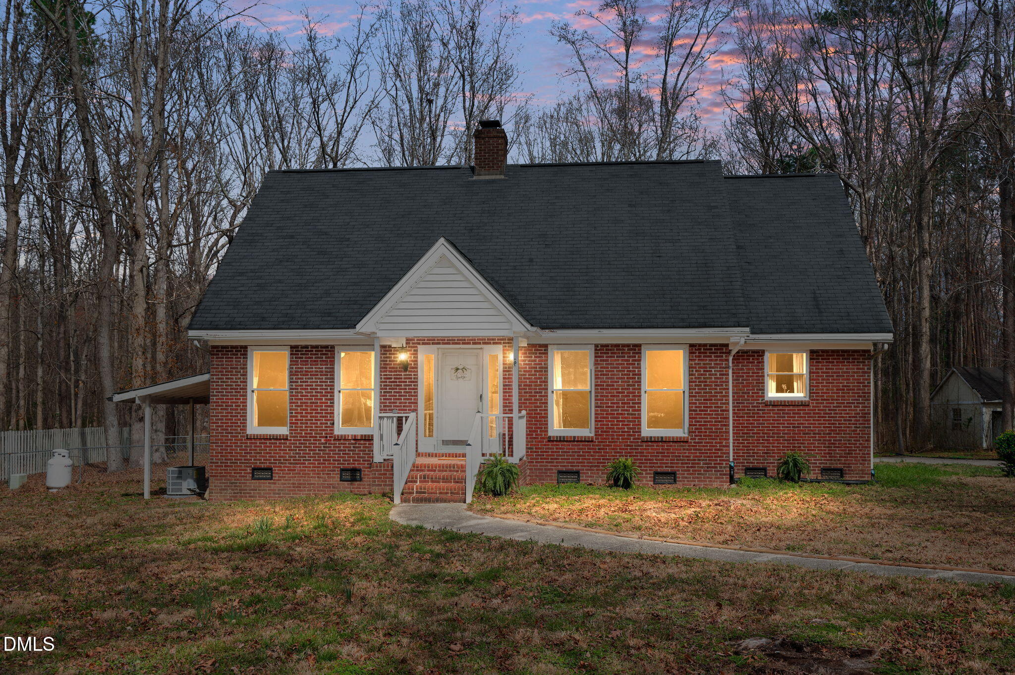9205 Tree Meadow Lane Raleigh, NC 27603 - Photo 1 of 44 Exterior Front - Twilight Photo