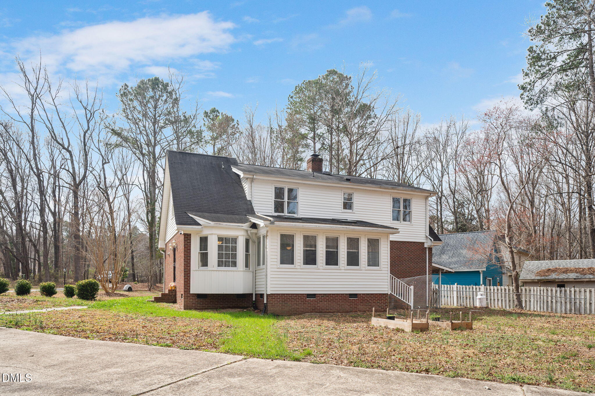 9205 Tree Meadow Lane Raleigh, NC 27603 - Photo 36 of 44 a view of a house with a yard