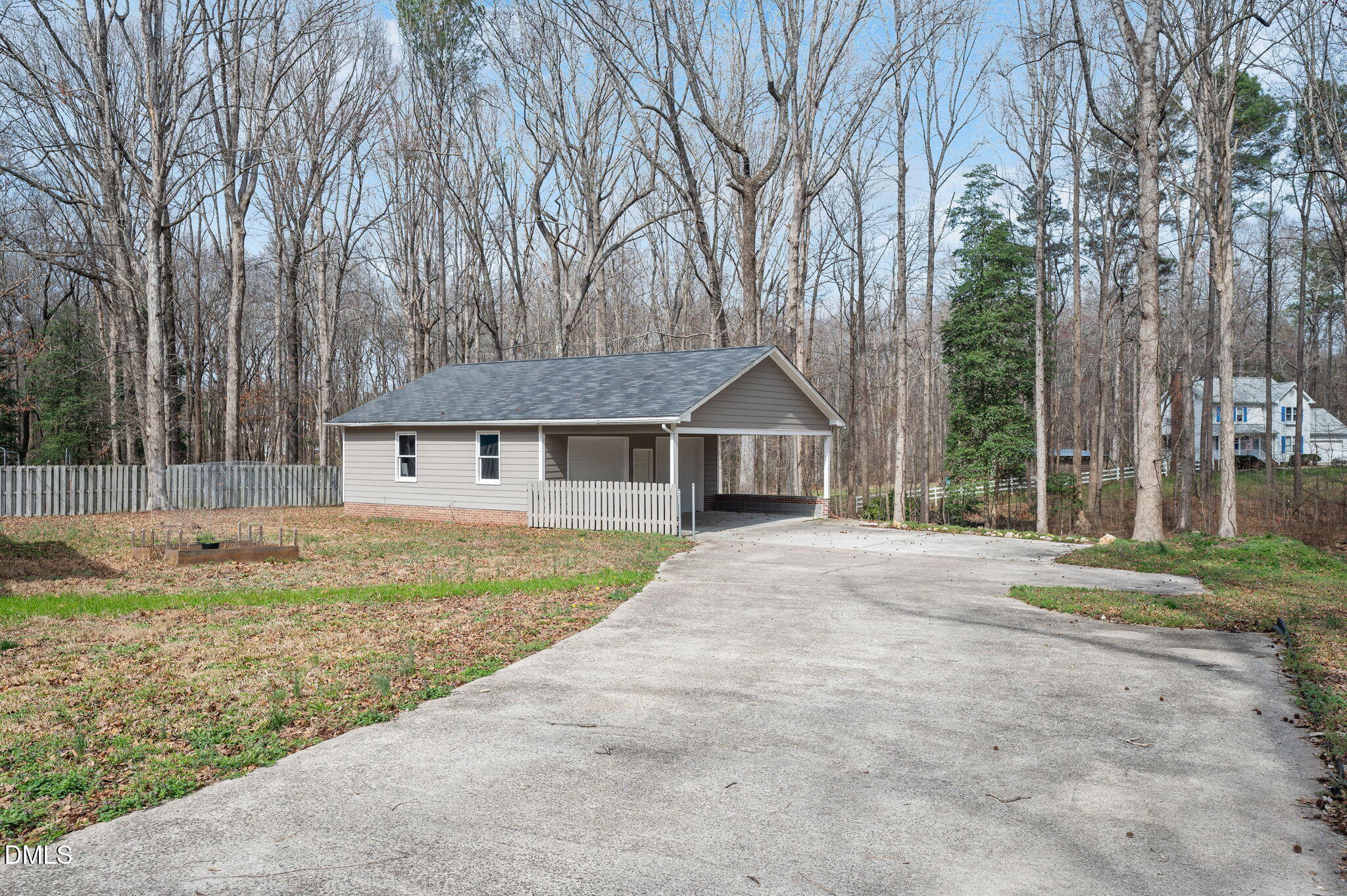 9205 Tree Meadow Lane Raleigh, NC 27603 - Photo 37 of 44 a front view of a house with a yard