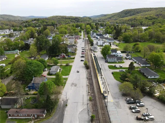 an aerial view of a city with lots of residential buildings