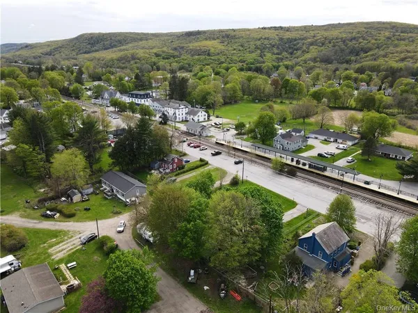 an aerial view of a house with a garden