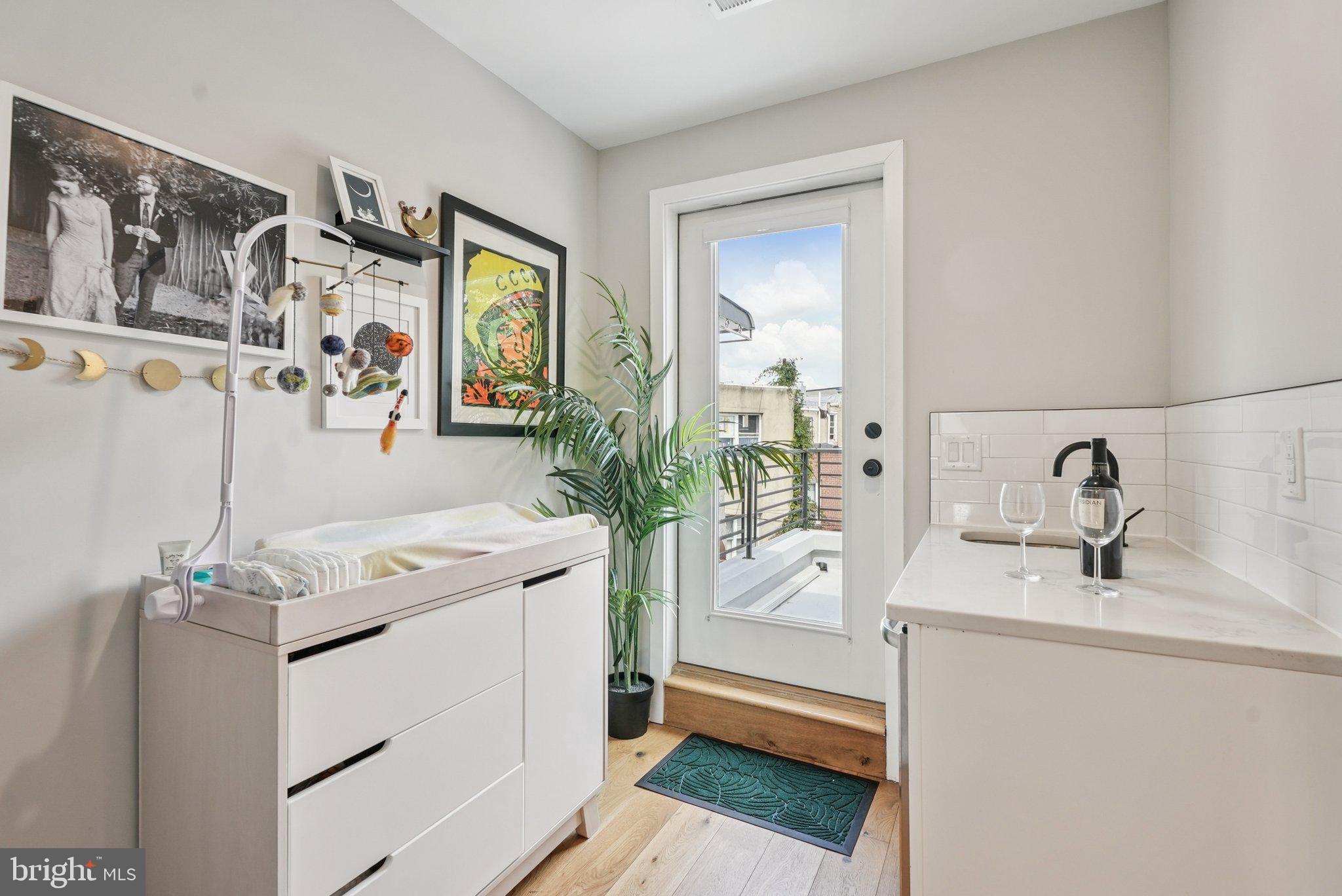 919 Reed Street Philadelphia, PA 19147 - Photo 23 of 28 a bathroom with a sink and a mirror