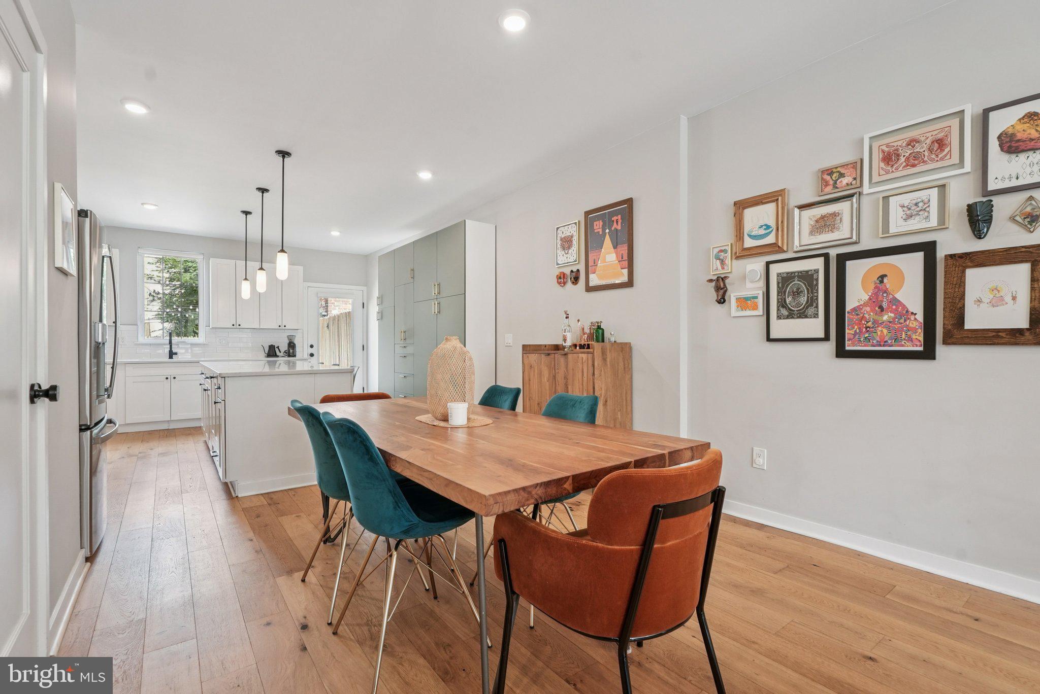 919 Reed Street Philadelphia, PA 19147 - Photo 6 of 28 a view of a dining room with furniture and wooden floor