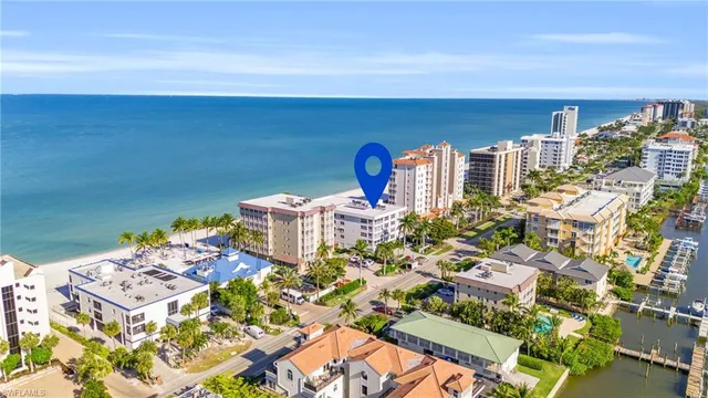 a picture of a lake with building in front of it