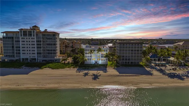 a view of a lake with a building in front of it