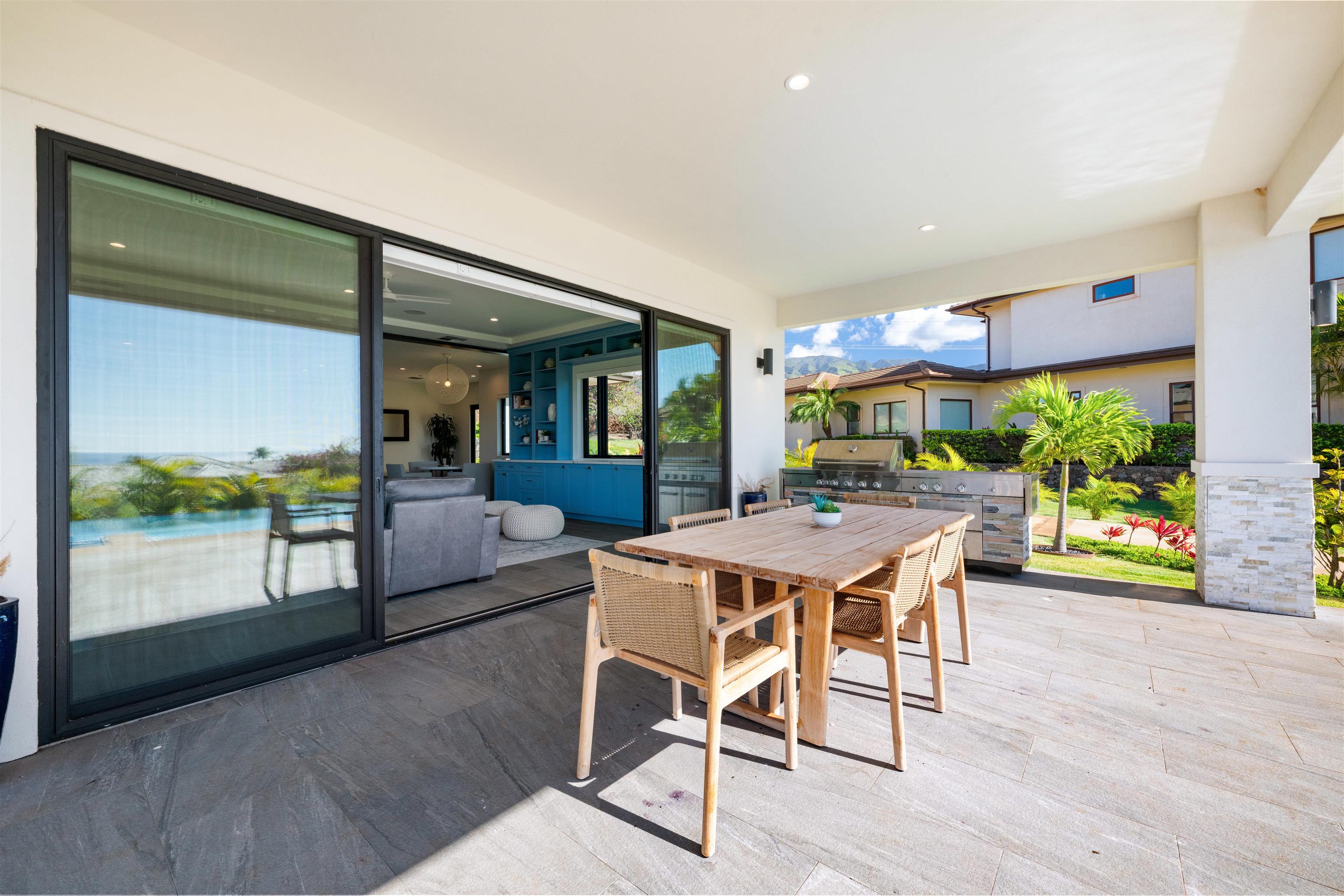 804 Anapuni Loop Lahaina, HI 96761 - Photo 13 of 49 a view of a dining room with furniture window and wooden floor
