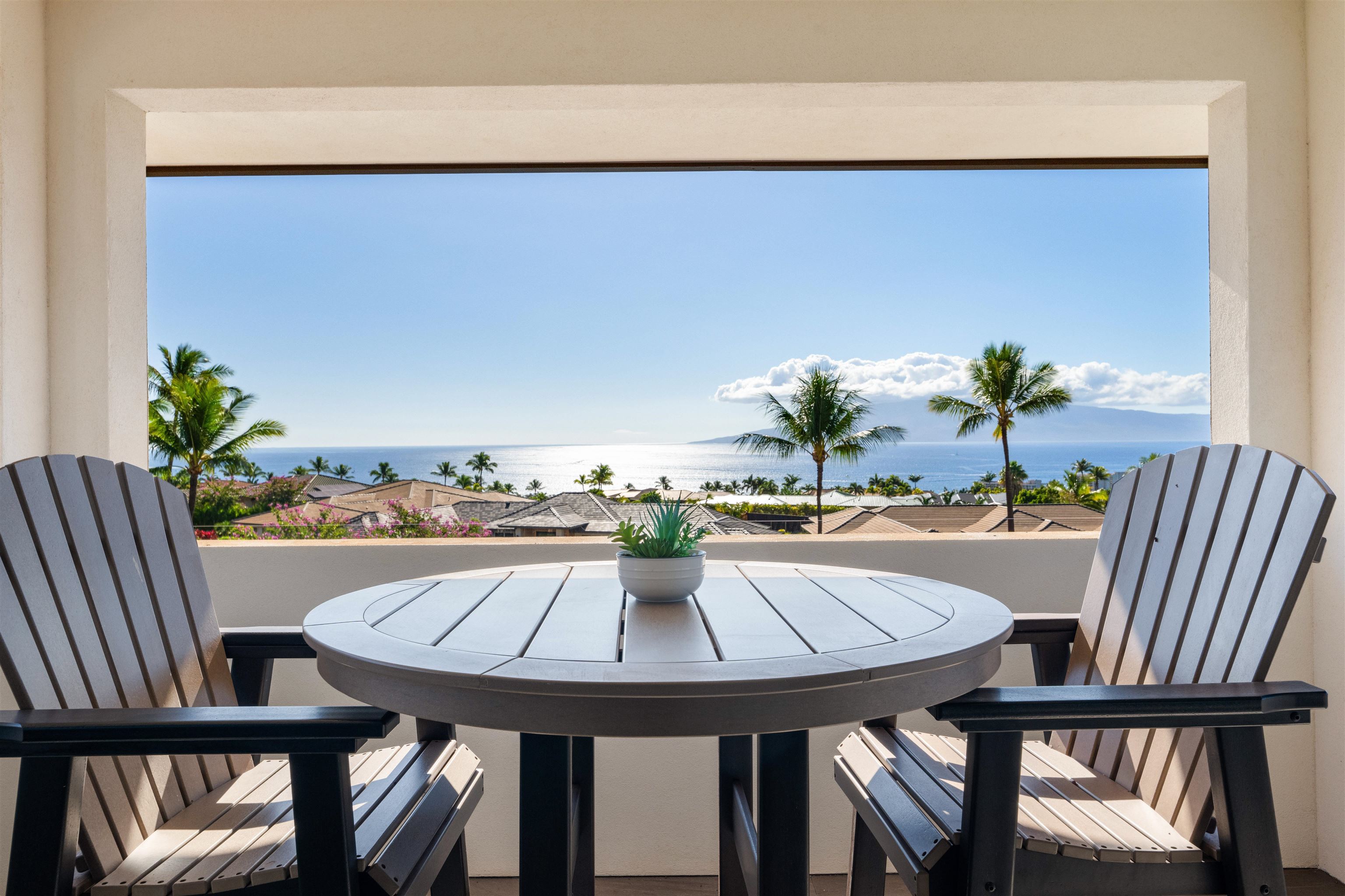 804 Anapuni Loop Lahaina, HI 96761 - Photo 18 of 49 a view of a dining room with furniture window and wooden floor