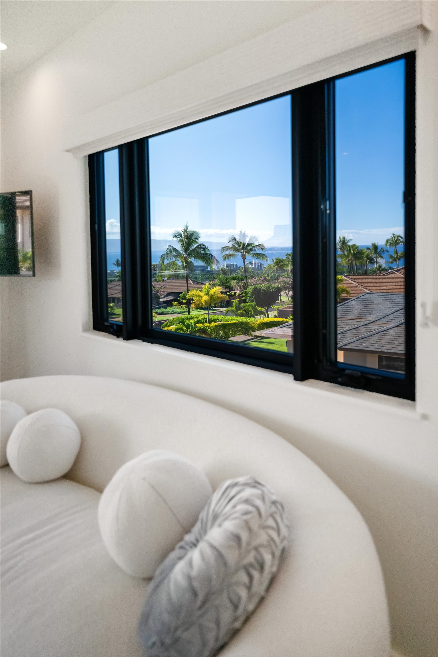 804 Anapuni Loop Lahaina, HI 96761 - Photo 19 of 49 a living room with furniture and a large window