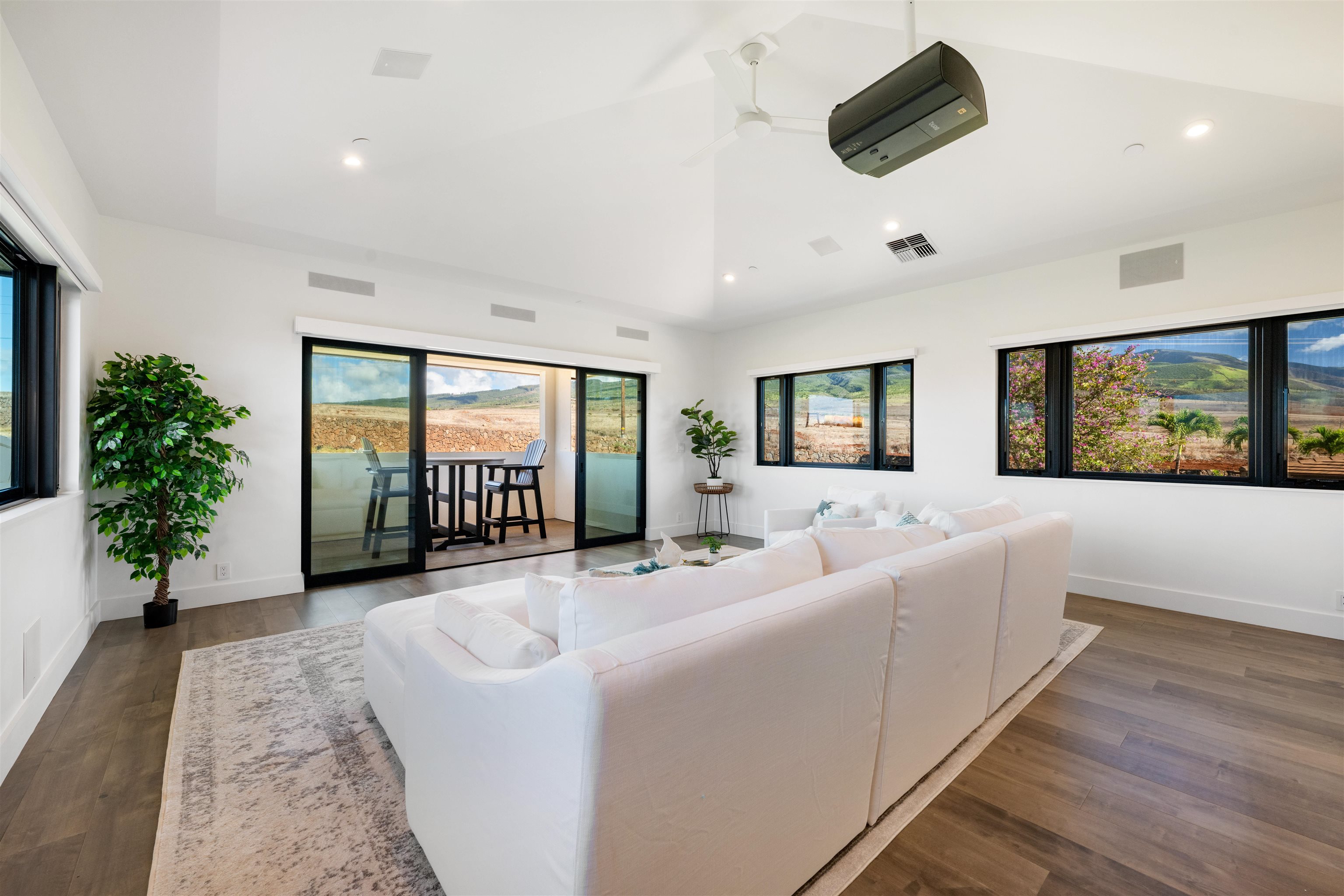 804 Anapuni Loop Lahaina, HI 96761 - Photo 31 of 49 a living room with furniture and a large window