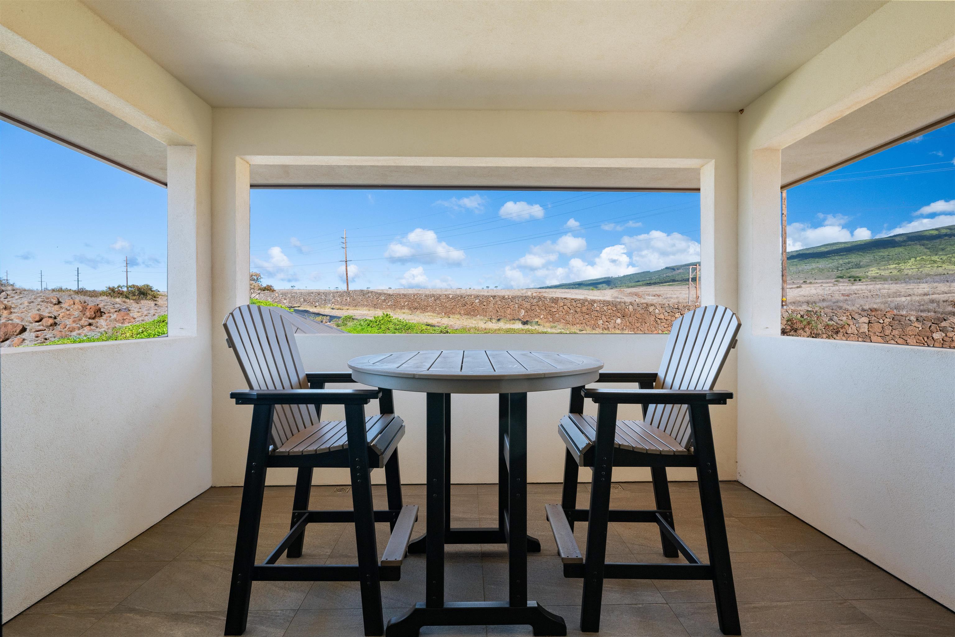 804 Anapuni Loop Lahaina, HI 96761 - Photo 33 of 49 a view of a dining room with furniture and wooden floor