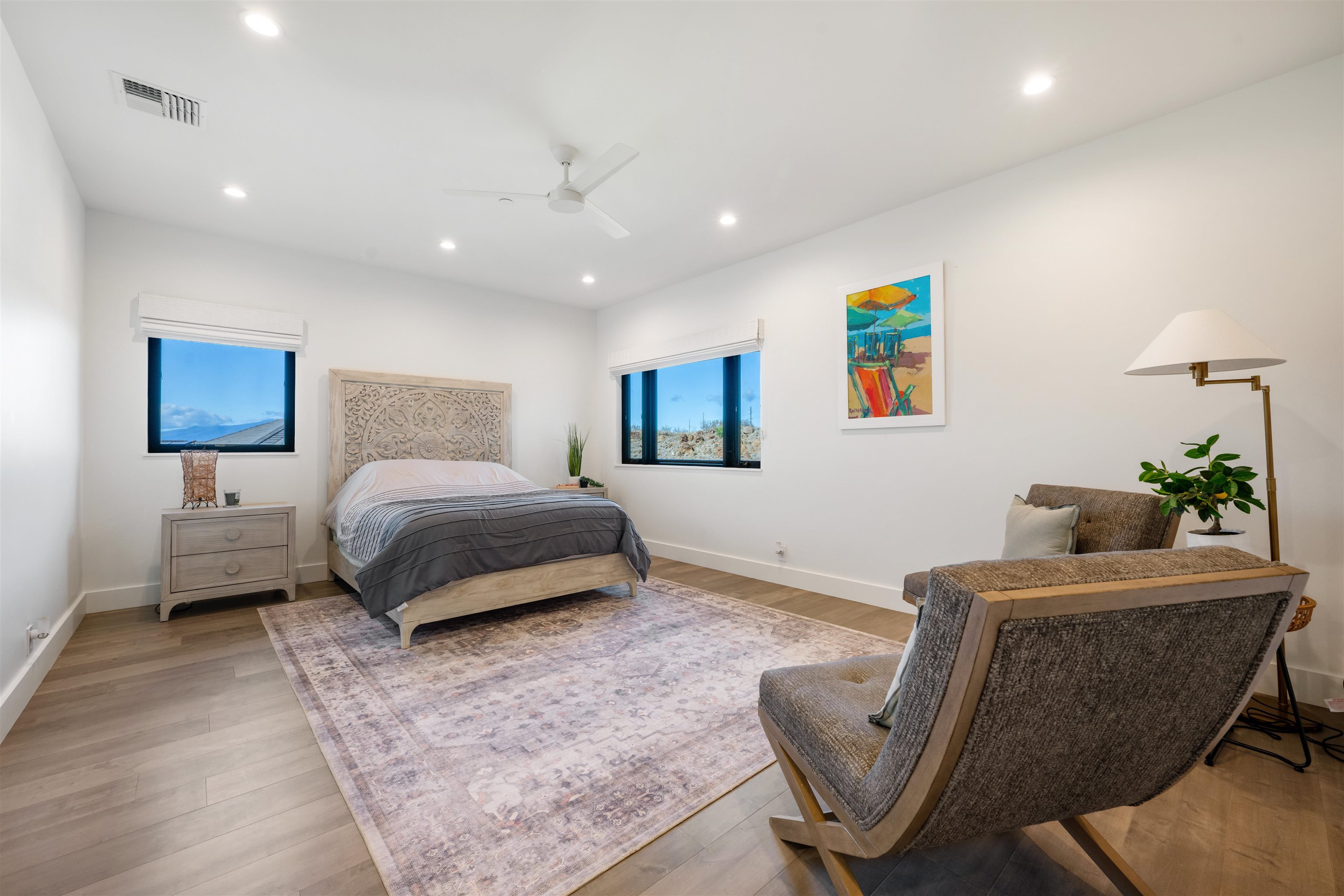 804 Anapuni Loop Lahaina, HI 96761 - Photo 34 of 49 a bedroom with a bed and a couch