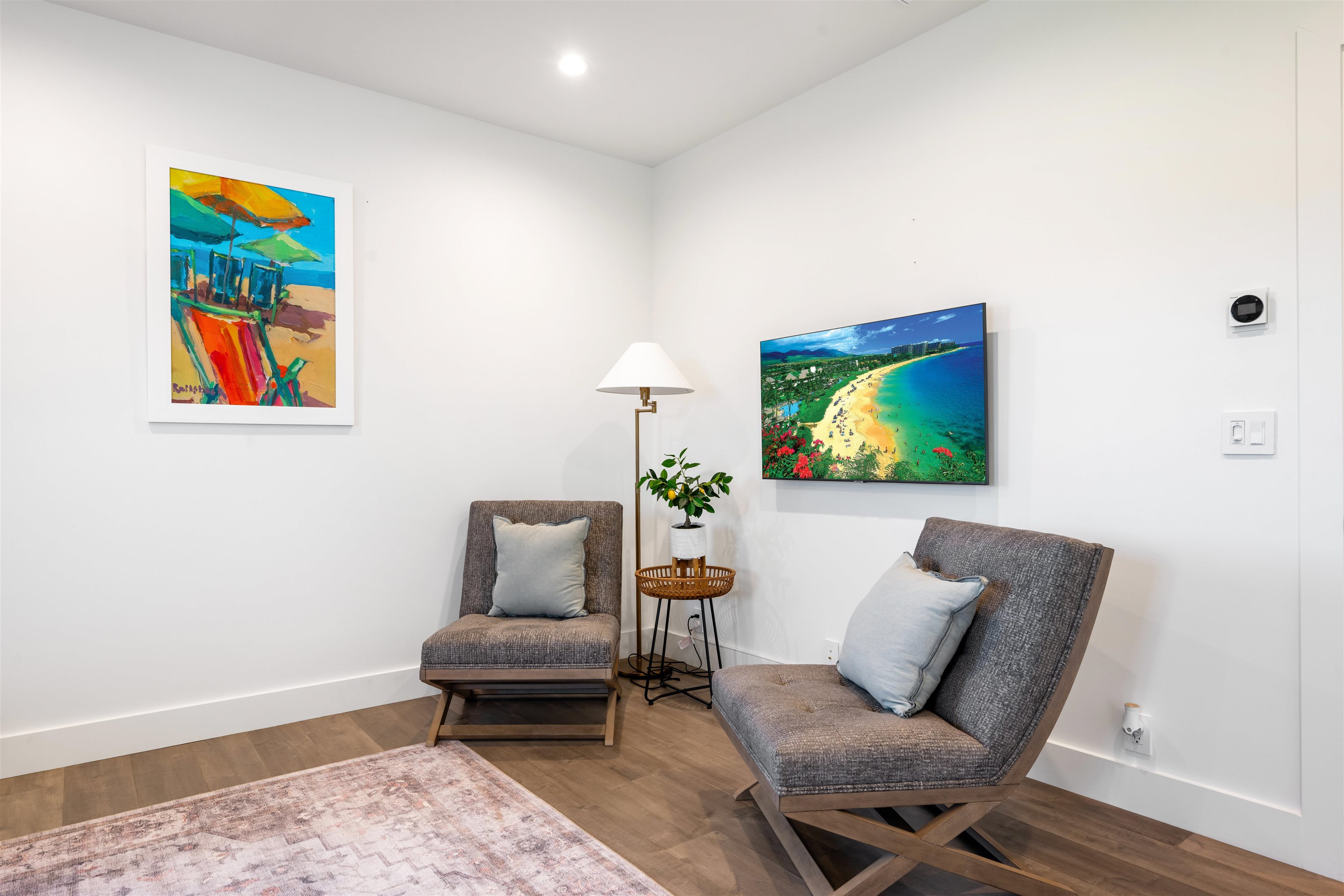 804 Anapuni Loop Lahaina, HI 96761 - Photo 35 of 49 a living room with furniture and a wooden floor