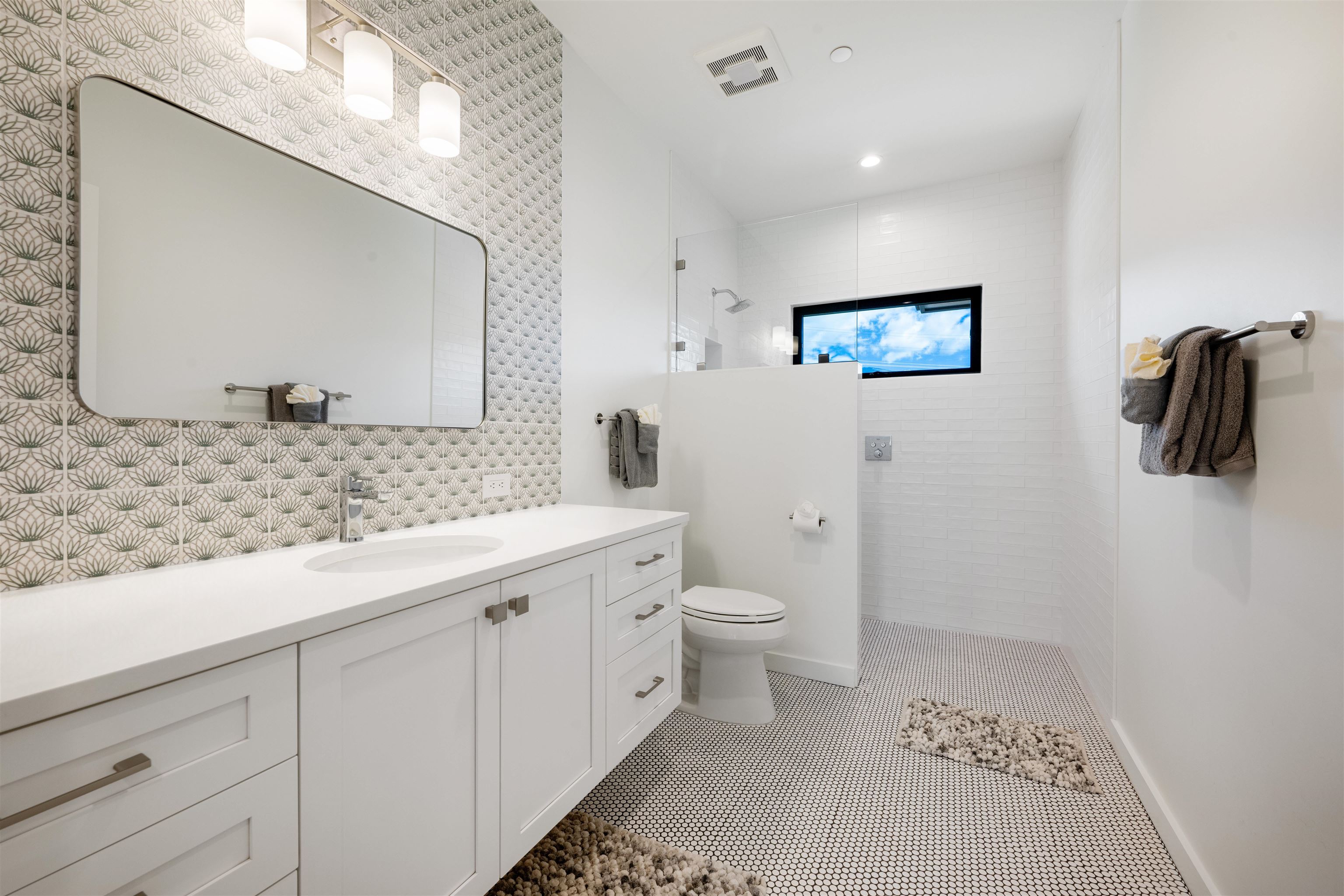 804 Anapuni Loop Lahaina, HI 96761 - Photo 36 of 49 a bathroom with a granite countertop sink a toilet and a mirror