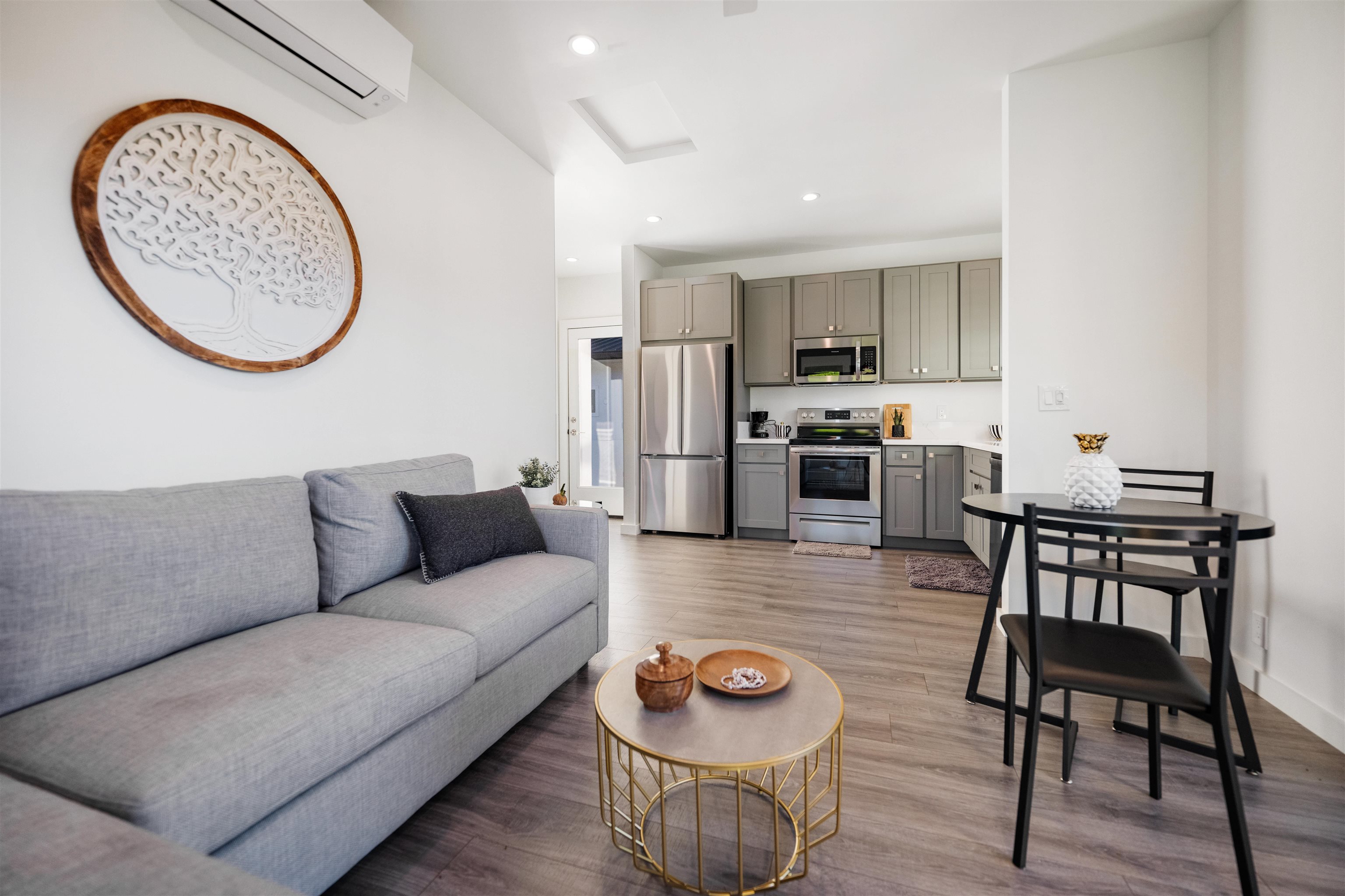 804 Anapuni Loop Lahaina, HI 96761 - Photo 46 of 49 a living room with furniture a mirror and a table