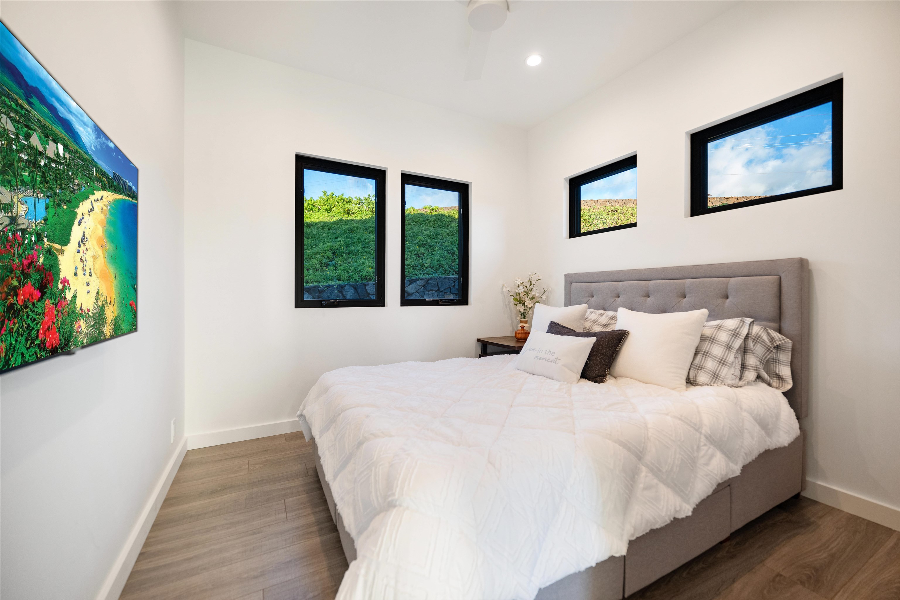 804 Anapuni Loop Lahaina, HI 96761 - Photo 48 of 49 a bedroom with bed and window