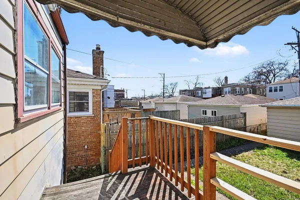 a view of a balcony with city view