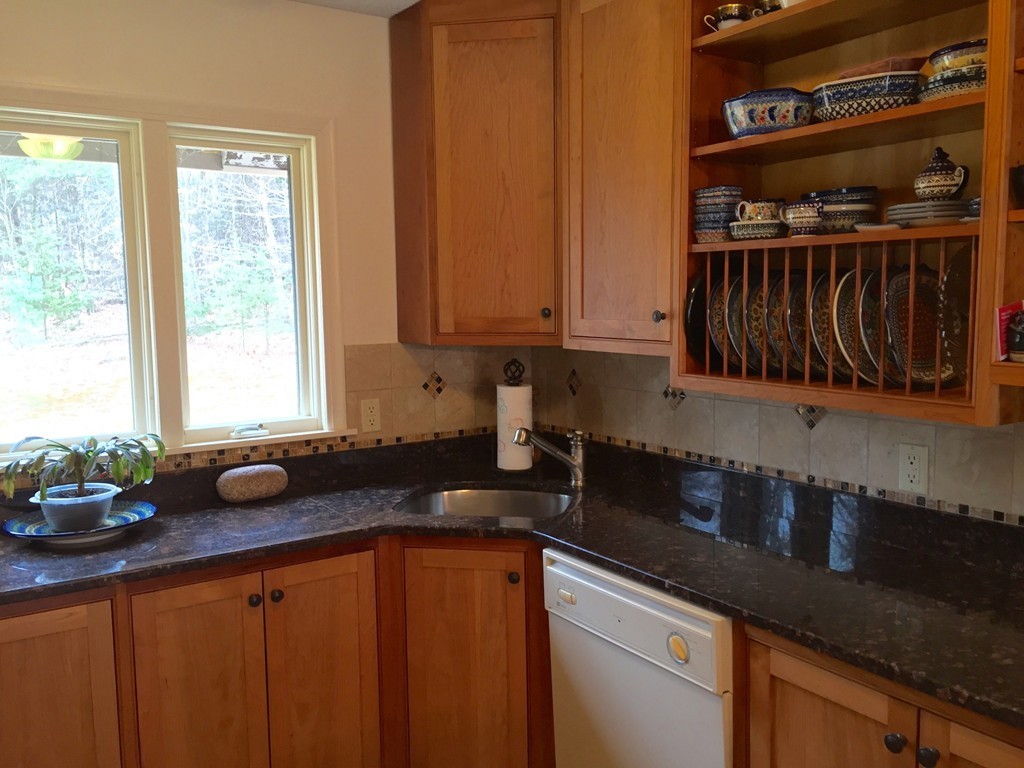 283 Main Road Chesterfield, MA 01012 - Photo 7 of 30 a kitchen with granite countertop a sink cabinets and window
