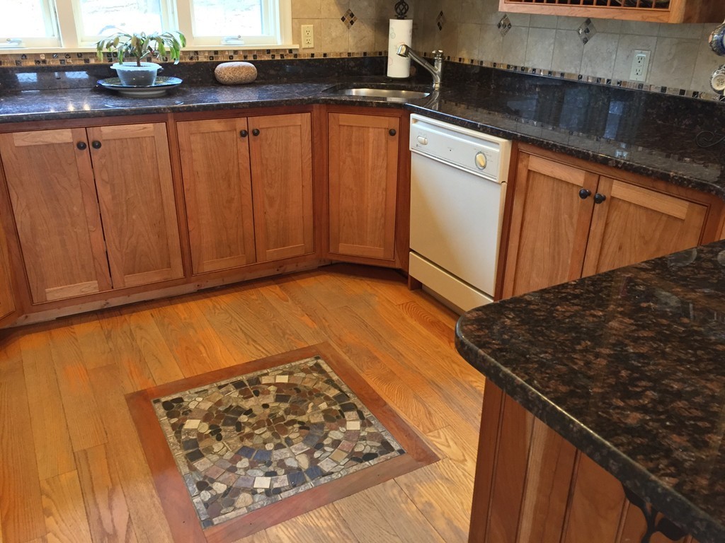 283 Main Road Chesterfield, MA 01012 - Photo 8 of 30 a view of a kitchen with granite countertop a sink dishwasher stove and cabinets