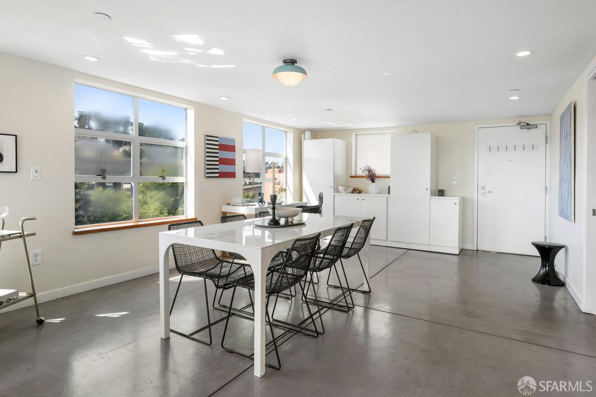 1325 Indiana Street, Unit 301 San Francisco, CA 94107 - Photo 13 of 41 a view of a dining room with furniture and a window