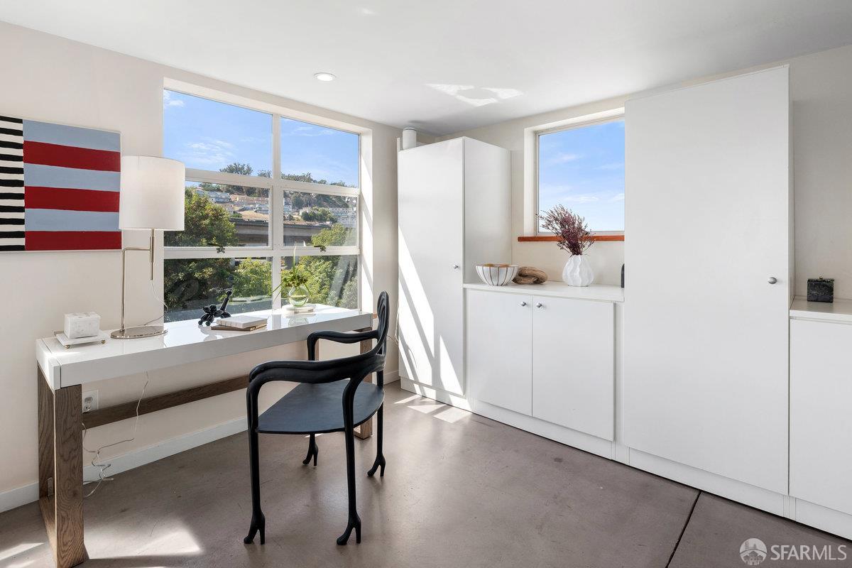 1325 Indiana Street, Unit 301 San Francisco, CA 94107 - Photo 14 of 41 a view of a workspace room with furniture and window