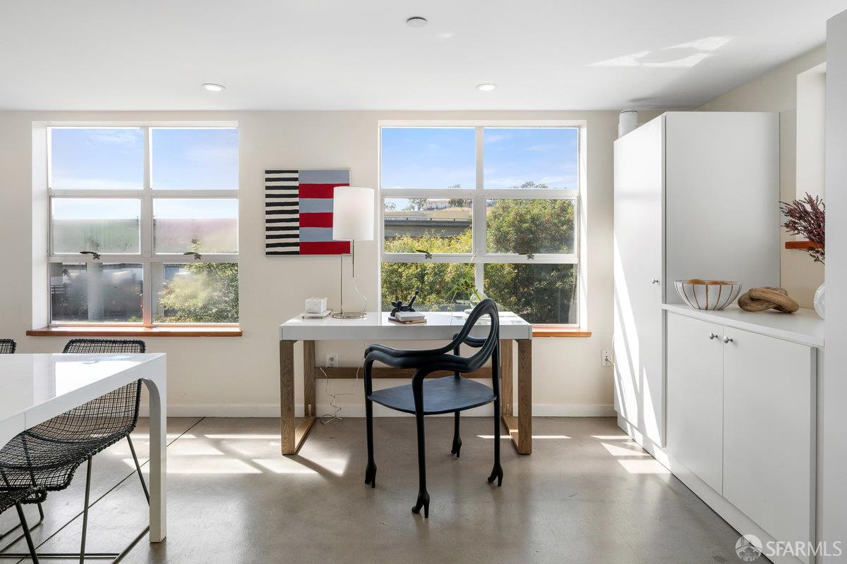 1325 Indiana Street, Unit 301 San Francisco, CA 94107 - Photo 15 of 41 a view of a dining room with furniture window and outside view