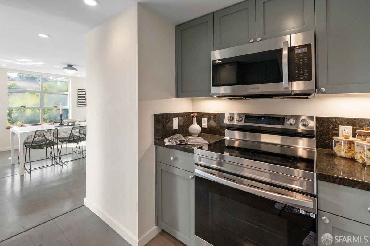 1325 Indiana Street, Unit 301 San Francisco, CA 94107 - Photo 16 of 41 a kitchen with a stove and a microwave