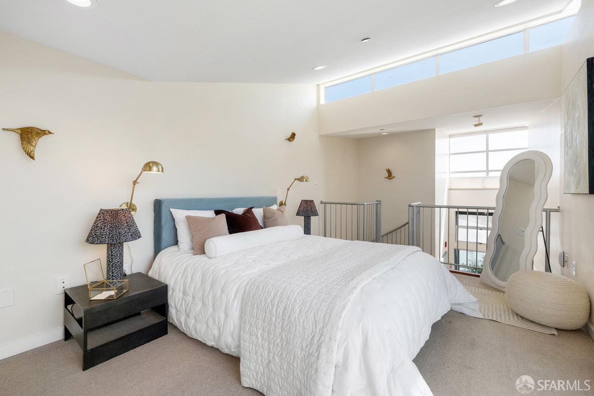 1325 Indiana Street, Unit 301 San Francisco, CA 94107 - Photo 23 of 41 a bedroom with bed and a chair